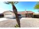 Charming single-story home with well-maintained landscaping, desert rock, and a two-car garage at 4008 E Knox Rd, Phoenix, AZ 85044