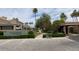 Beautifully landscaped entrance to The Gardens community with lush greenery and inviting walkway at 4015 N 78Th St # 135, Scottsdale, AZ 85251