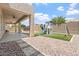 The backyard features a patio with a playset and a trampoline providing plenty of fun at 42726 N Livingstone Way, Anthem, AZ 85086