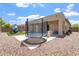Backyard features a trampoline and rock landscaping, a perfect spot for fun and play at 42726 N Livingstone Way, Anthem, AZ 85086