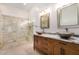 Primary bathroom features a glass-enclosed shower, double sinks and granite counters at 4345 E Annette Dr, Phoenix, AZ 85032
