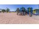 Bright and colorful playground on a sand base with play equipment at 4345 E Annette Dr, Phoenix, AZ 85032