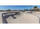 Outdoor skate park with concrete bowls and smooth transitions for skaters at 4345 E Annette Dr, Phoenix, AZ 85032