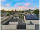 An aerial view of the house that features a fenced in backyard, solar panels and a gazebo at 4400 N 20Th St, Phoenix, AZ 85016