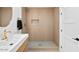 Bathroom with tiled shower and modern fixtures at 4400 N 20Th St, Phoenix, AZ 85016