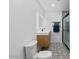 Modern bathroom with mosaic tile floor, updated vanity, and glass-enclosed shower at 4400 N 20Th St, Phoenix, AZ 85016
