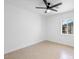 Neutral bedroom with tile floors, ceiling fan and natural light at 4400 N 20Th St, Phoenix, AZ 85016
