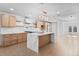 Bright and airy kitchen with marble countertops, wood cabinets, and stainless steel appliances and tiled backsplash at 4400 N 20Th St, Phoenix, AZ 85016