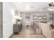 Stylish Gathering room with a modern console table, couch, and window at 4423 W Lodge Dr, Laveen, AZ 85339