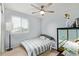 Bedroom with neutral walls, ceiling fan, and carpet flooring at 4807 W St Anne Ave, Laveen, AZ 85339