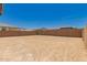 Large backyard with block wall and mountain views in the background at 5023 W Hardtack Trl, Laveen, AZ 85339