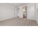Bright bedroom featuring neutral carpet, white walls, and an ensuite bathroom at 5023 W Hardtack Trl, Laveen, AZ 85339