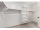 Walk-in closet with shelves and a clothes rod at 5023 W Hardtack Trl, Laveen, AZ 85339