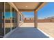 Covered patio with views of a blank canvas backyard and mountain views at 5023 W Hardtack Trl, Laveen, AZ 85339