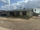 Single story home with gravel front yard and covered entryway offers classic curb appeal at 564 N Santa Anna St, Mesa, AZ 85201