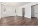 Large bedroom with hardwood floors, recessed lighting, and a view of the property at 5744 E Lowden Rd, Cave Creek, AZ 85331