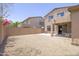 The backyard has gravel landscaping, block wall fencing, and a covered patio at 7227 E Northridge St, Mesa, AZ 85207