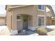 Charming home with a green front door, decorative wreath, and well-maintained landscaping at 7227 E Northridge St, Mesa, AZ 85207