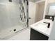 Contemporary bathroom with a walk-in shower, modern fixtures, and stylish tile at 7840 N 7Th St # 15, Phoenix, AZ 85020