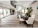 Open living room with high ceilings and a view of the upper level and modern kitchen at 7840 N 7Th St # 15, Phoenix, AZ 85020