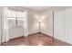 Neutral bedroom with a large window offering natural light and spacious closet at 925 W Hudson Way, Gilbert, AZ 85233
