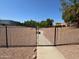 Gated community park with walking paths and lush landscaping, inviting residents to enjoy the outdoors at 925 W Hudson Way, Gilbert, AZ 85233