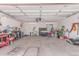 Spacious garage with built-in storage, tool racks, and plenty of workspace at 925 W Hudson Way, Gilbert, AZ 85233