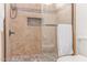 Attractive tiled shower with glass door features and bronze fixtures at 925 W Hudson Way, Gilbert, AZ 85233