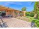 Backyard showcasing landscaping, patio, a covered outdoor dining space and a swing set at 1040 E Clinton St, Phoenix, AZ 85020