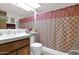 Bathroom with a shower and tub combination and a sink with a cabinet base at 1040 E Clinton St, Phoenix, AZ 85020