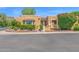 Charming home featuring well-manicured landscaping and a welcoming facade with colorful flowers enhancing its curb appeal at 1040 E Clinton St, Phoenix, AZ 85020