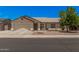 Charming single-story home featuring a well-maintained front yard, two-car garage, and inviting curb appeal at 10852 E Contessa St, Mesa, AZ 85207