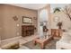 Comfortable living room featuring neutral walls, a fireplace, and ample space for relaxing and entertaining guests at 10852 E Contessa St, Mesa, AZ 85207