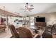 Bright living space with an open layout connecting kitchen and patio, offering a blend of indoor and outdoor living at 10852 E Contessa St, Mesa, AZ 85207
