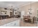 Spacious living area flows from the kitchen and dining areas, creating a cohesive and inviting atmosphere at 10852 E Contessa St, Mesa, AZ 85207