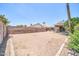 Unfinished backyard, offering a blank canvas for your dream landscaping and outdoor living space at 10943 W Alice Ave, Peoria, AZ 85345