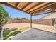 Expansive backyard with covered patio, block fence, and potential for outdoor living and landscaping at 10943 W Alice Ave, Peoria, AZ 85345