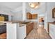 Functional kitchen with tile floors, ample counter space, and white appliances at 10943 W Alice Ave, Peoria, AZ 85345