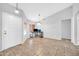 Bright living room with tile floors, neutral walls, and ample natural light at 10943 W Alice Ave, Peoria, AZ 85345