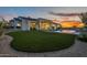 Expansive backyard with well-maintained lawn and elegant desert landscaping at 11250 W Prospector Dr, Queen Creek, AZ 85144