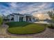 Expansive backyard featuring a well-maintained lawn, patio, and a sparkling pool, ideal for luxurious outdoor living at 11250 W Prospector Dr, Queen Creek, AZ 85144