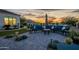 Outdoor seating area with stylish patio furniture and well-manicured landscaping at 11250 W Prospector Dr, Queen Creek, AZ 85144