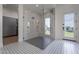 Open shower featuring glass surround and custom tile work, with direct access to the backyard at 11250 W Prospector Dr, Queen Creek, AZ 85144