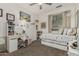 Well-organized bedroom features a study desk and bed with built-in storage drawers at 12062 W Duane Ln, Peoria, AZ 85383