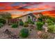 Attractive Southwestern landscaping featuring mature desert plants and rock ground cover at 12062 W Duane Ln, Peoria, AZ 85383