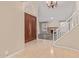 Spacious foyer with marble floors and a staircase leads to the upper level at 1211 E Desert Flower Ln, Phoenix, AZ 85048