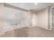 Carpeted loft with staircase and railing at 1211 E Desert Flower Ln, Phoenix, AZ 85048