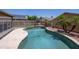 Aerial view of the refreshing pool with volleyball net, perfect for summer recreation and relaxation at 12933 W Monterey Way, Avondale, AZ 85392
