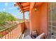 Relaxing balcony seating area with scenic desert views, terracotta tones, and natural light at 13227 N Mimosa Dr # 101, Fountain Hills, AZ 85268