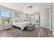 Bedroom with plenty of light, balcony access and hardwood flooring at 13227 N Mimosa Dr # 101, Fountain Hills, AZ 85268